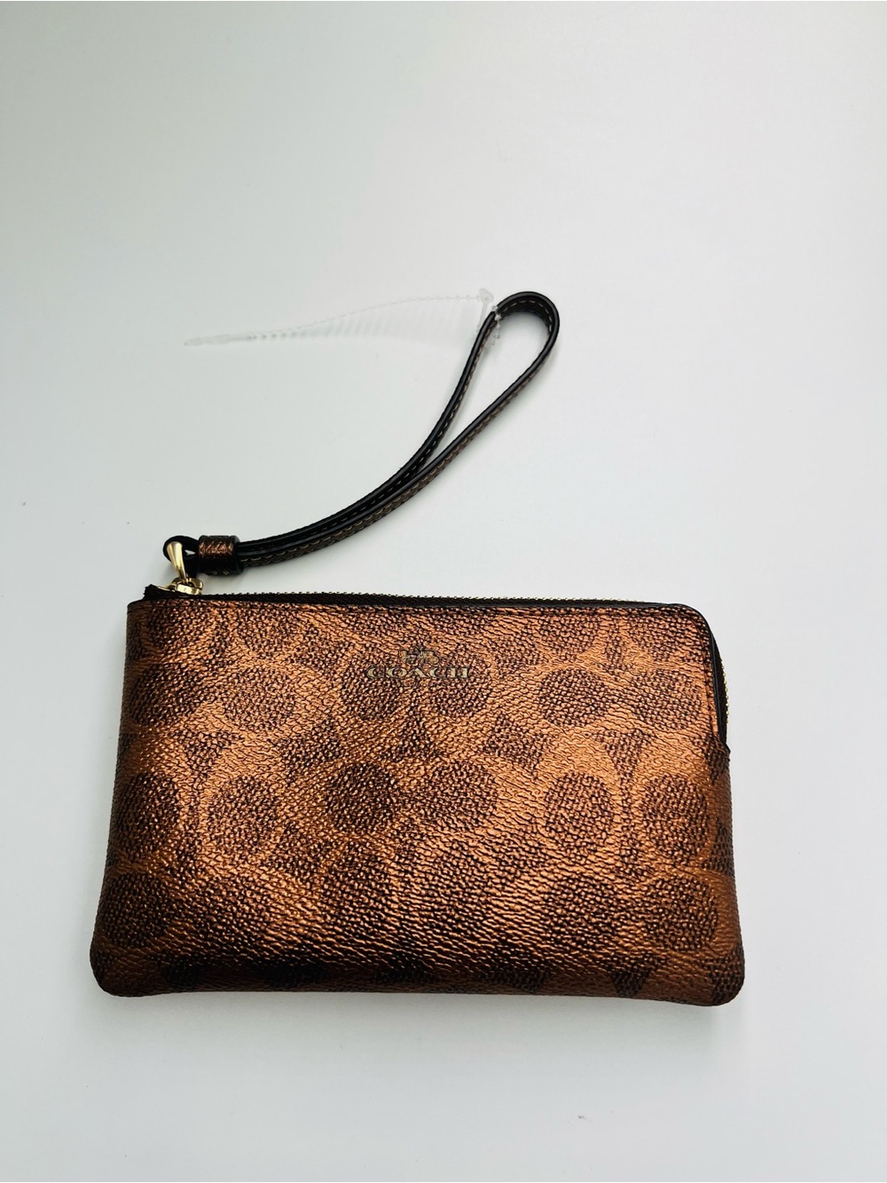 Coach Metallic Bronze and Copper Corner Zip Wristlet EUC